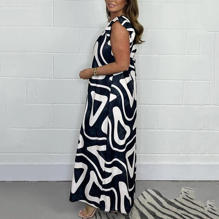 Nova | Women's Abstract Print V-Neck Ruffle Sleeve Wide Leg Jumpsuit
